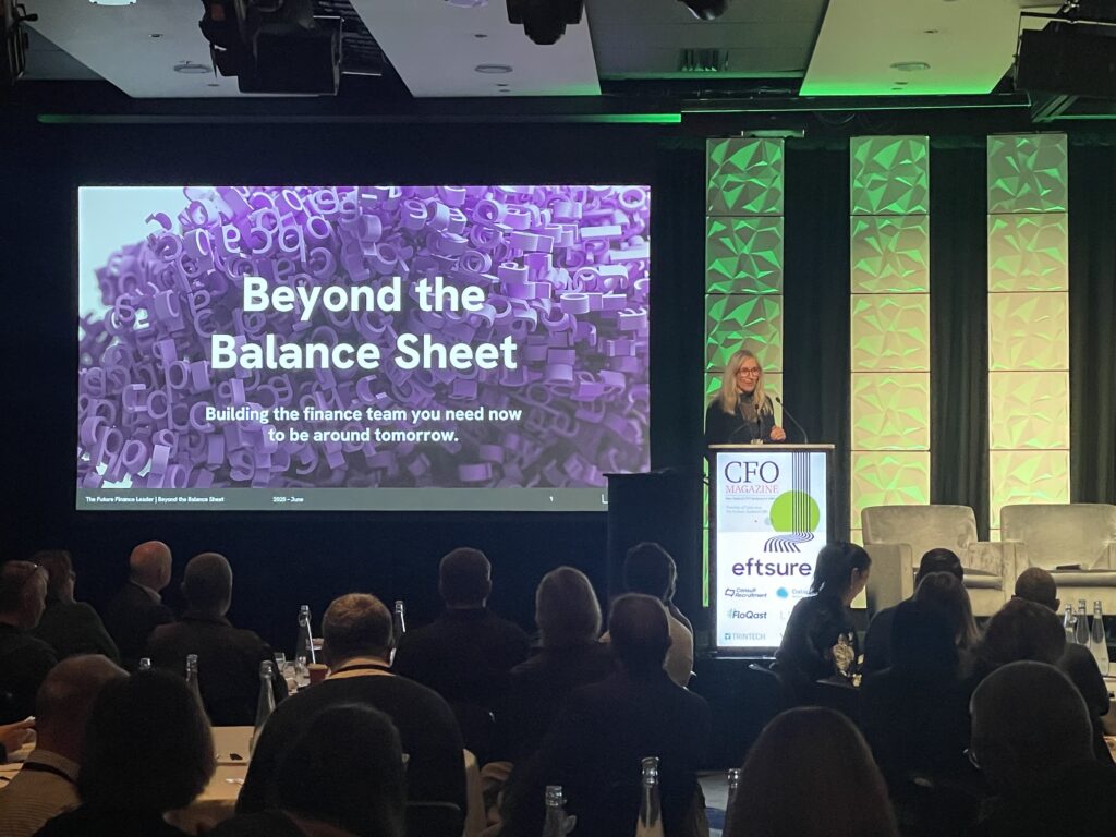 Angela Cameron from LEAD Executive Search speaking on stage at CFO Symposium 2025 NZ